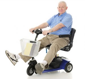 Elderly man on mobility scooter